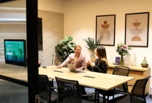 Meeting room with people 300x204